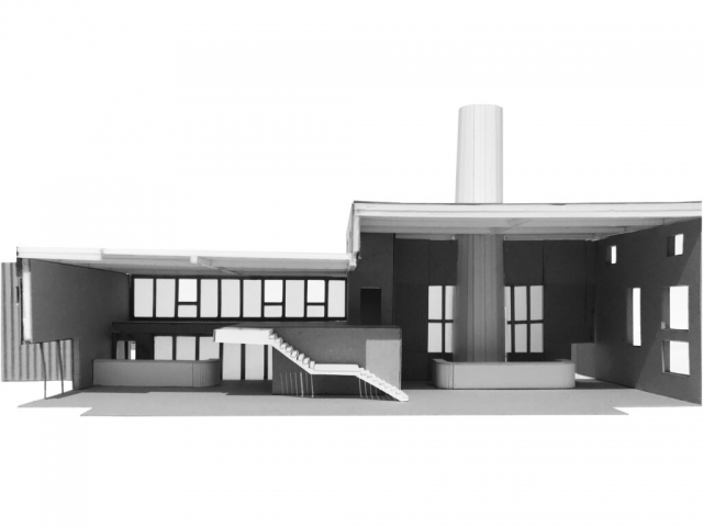 An Interior model of the bottling building. It is grey in colour and shows reception desk to the right and stairs up to the mezzanine on the left