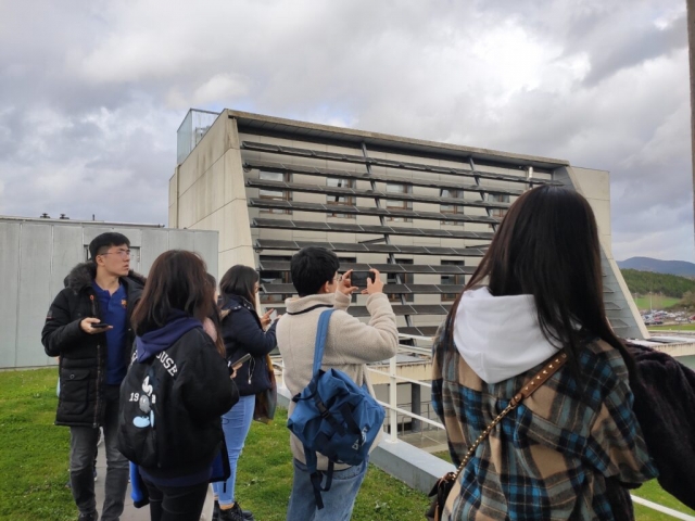 Students on the roof of the Cener National Renewable Energy Centre building